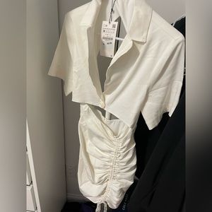 Selling a beautiful white cutout Zara dress brand new.